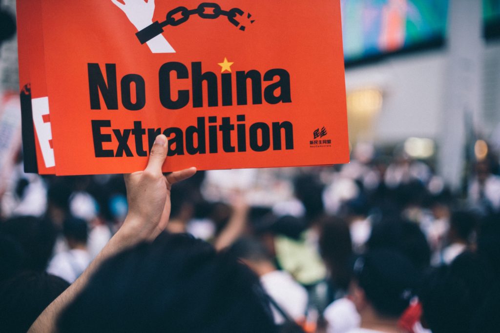 Protester holding a sign in Hong Kong
