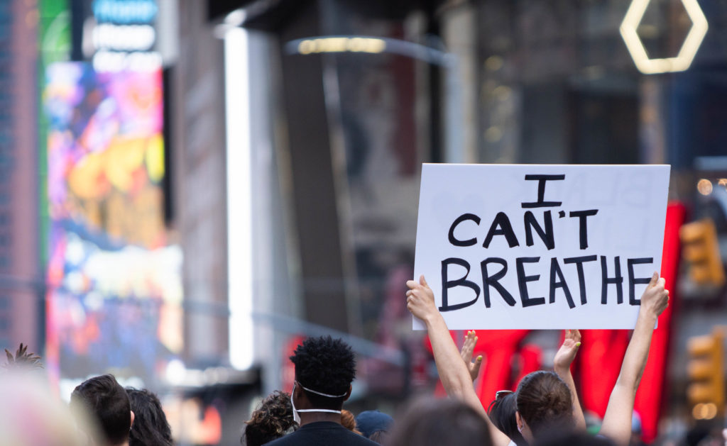 Protester holds up a sign at a Black Lives matter protest in the United States